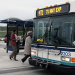 passengers boarding Metro bus